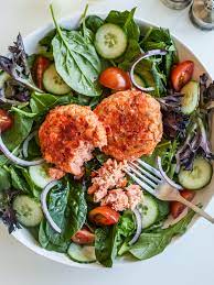 MUSHROOM AND SALMON BURGER OVER SALAD